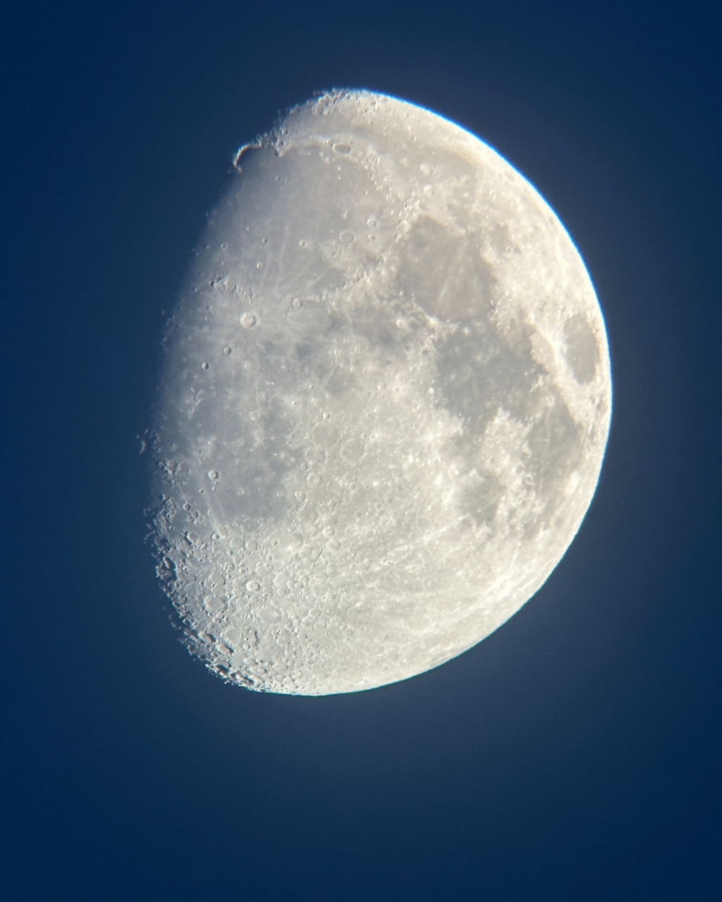 A close up shot of the moon, waning gibbous, taken through my telescope.