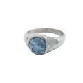 Front view of a sterling silver aquamarine signet ring showing natural gemstone inclusions on a white background.