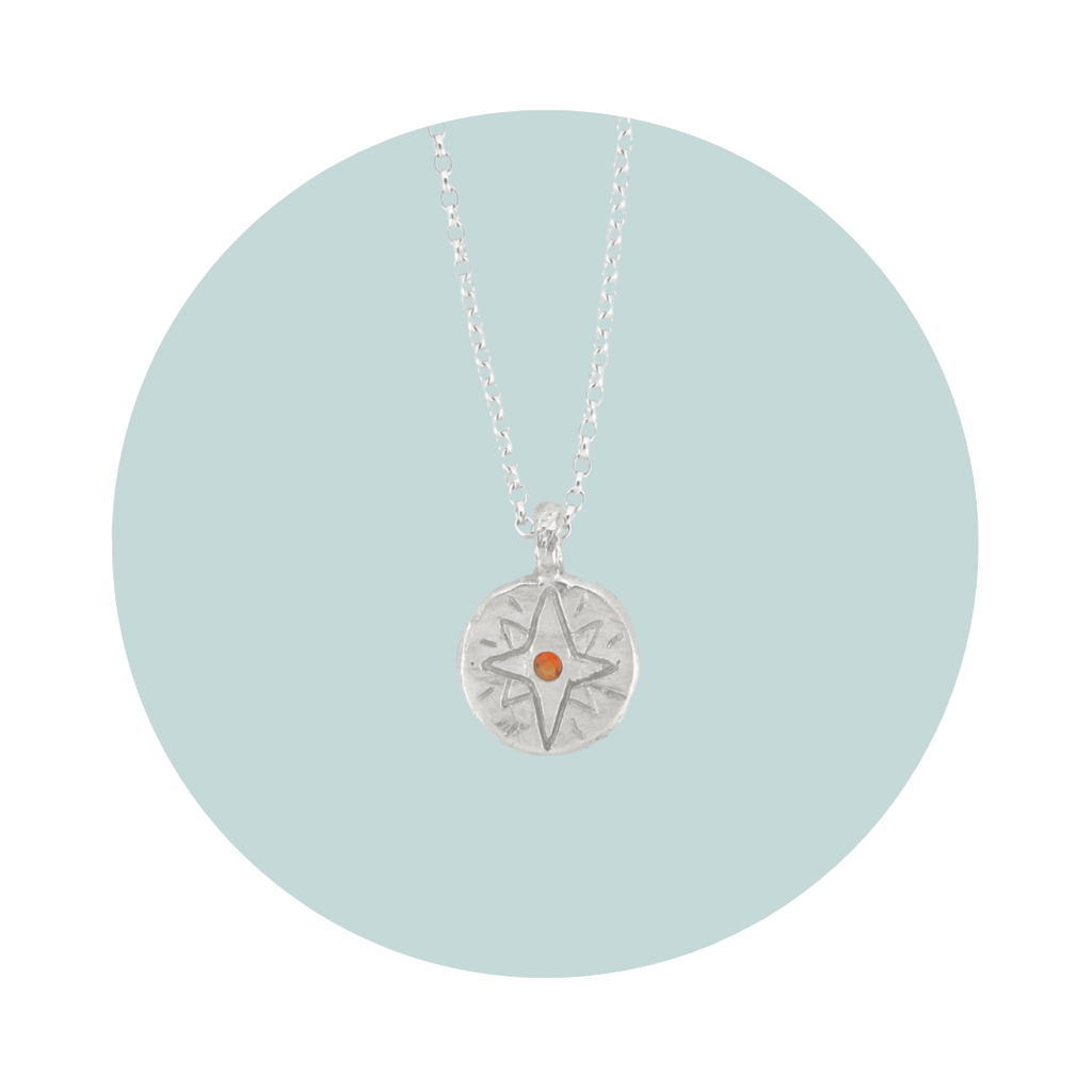 Recycled silver North Star pendant necklace with citrine November birthstone, flush set to symbolise joy, abundance and positive energy.